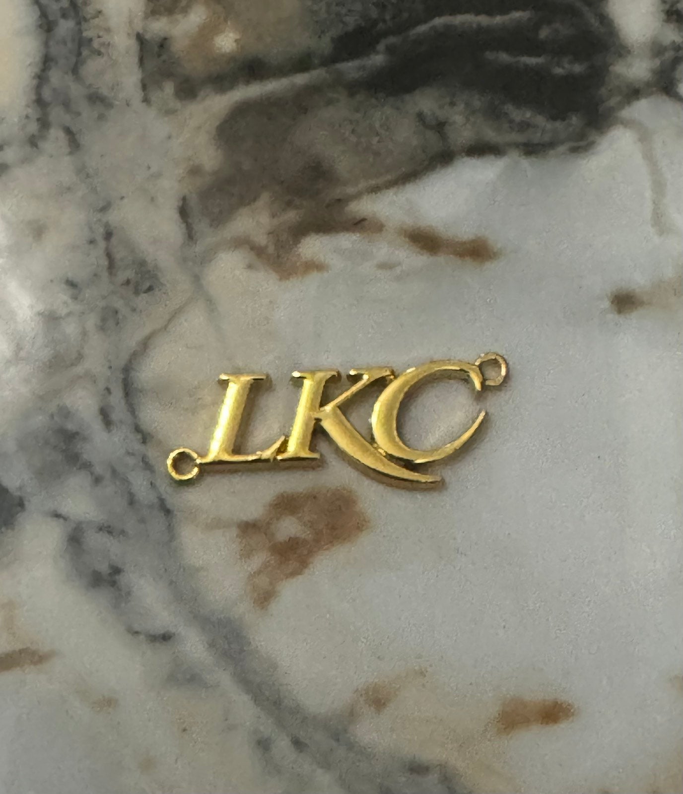 New Lkc gold plated logo
